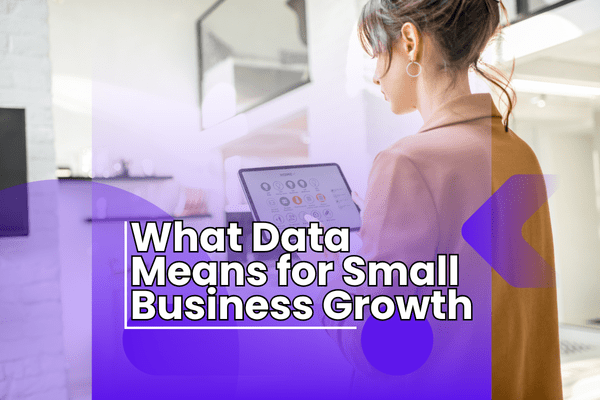person looking at a screen with charts and notes, checking small business data